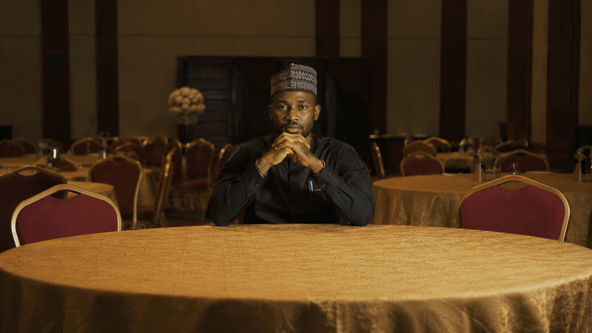 Man in thought at a table